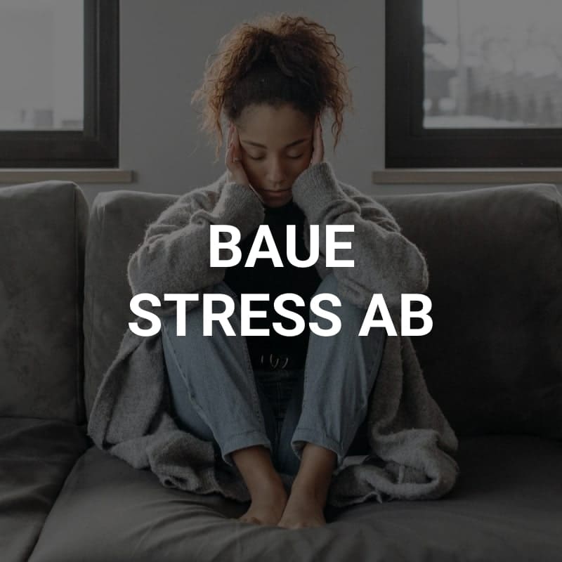 stressed woman with hands on temples